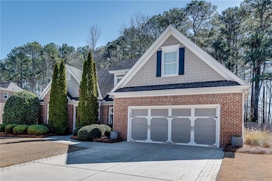 View of front of property featuring concrete drive