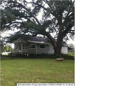 Front of house from side angle.