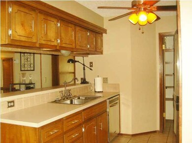 Nice Kitchen area with stainless steel sink and Di