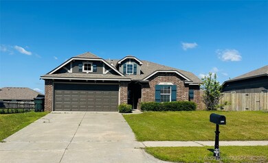 View of front facade featuring brick siding, concr
