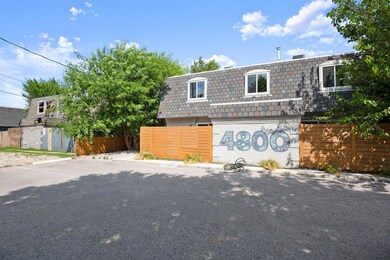 Front of property featuring mansard roof and bric