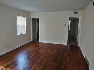 View of hardwood floored empty room