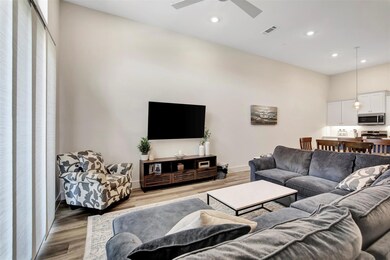 Living room featuring light hardwood / wood-style 