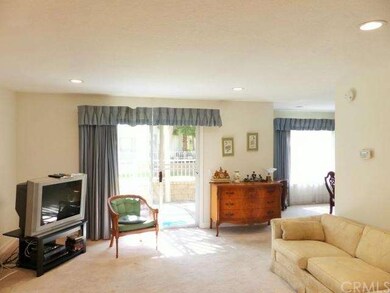 Living room with access to exterior patio