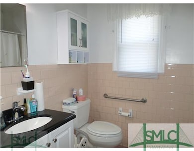 Bathroom. Tidy tile bath room, new cabinet