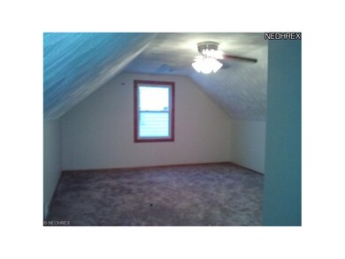 Upstairs bedroom with new windows, large closet.