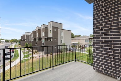 Balcony featuring a residential view