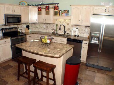 Gourmet Chef's Kitchen is 17x16 with Island, grani
