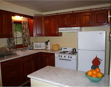 Kitchen. The newer cherry kitchen has plenty of co