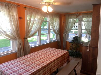 Beautiful morning room that fits a large table.