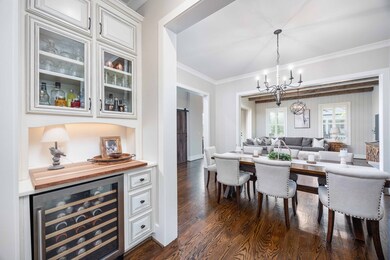bar area open to living room and dining room