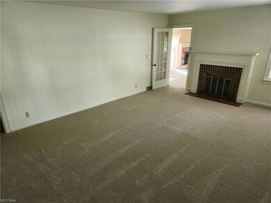 Living Room with Fireplace & New Carpet
