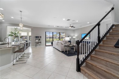 Wood-like covered stairs adorn the main living space welcoming family and/or guests