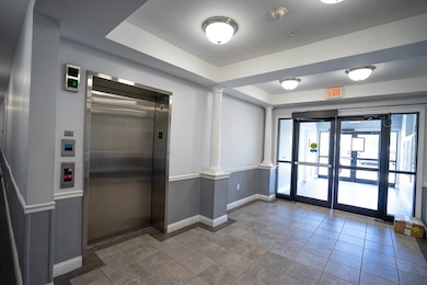 Spicket Commons unit 404, Methuen, MA 01844 - photo 6