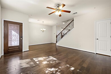 Entrance foyer with baseboards, visible vents, da