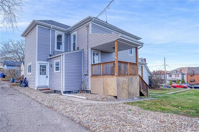 Side entrance on side porch is for the second floo