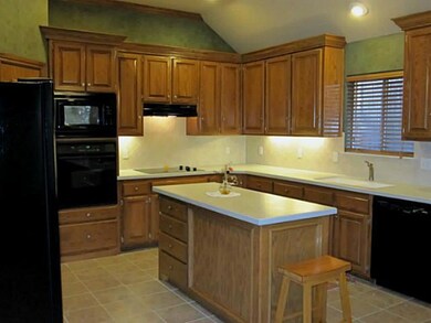 Kitchen. Electric smooth-top stove and built-in ov