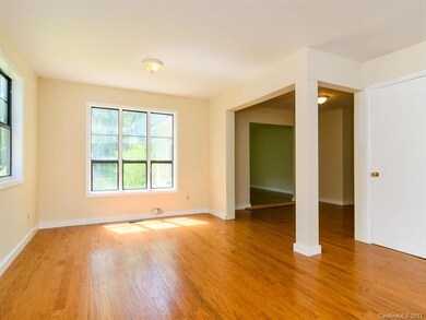 Adjacent to the Living Room is the original Dining