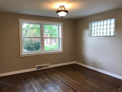 Dining Room has original cleaned hard wood floor a
