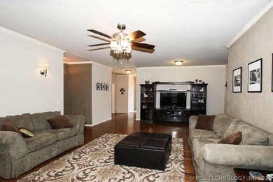 Very large living with new wood floors, & gas log