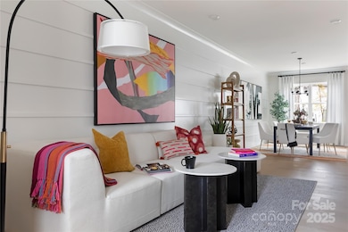 Upon entering the home, you are greeted with a great room leading into the dining and kitchen spaces.  *Model Photos | Actual finishes, structural selections, and orientation may vary.