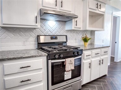 remodeled kitchen w/granite tops