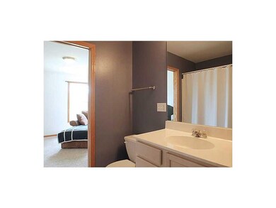 Bathroom-L1. Bath between back entry and 2nd bedro