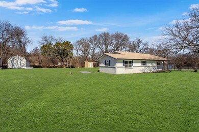 View of yard with a shed