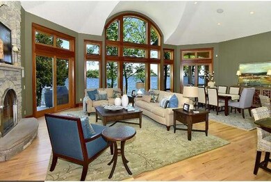 High ceilings and floor-to-ceiling windows bring n