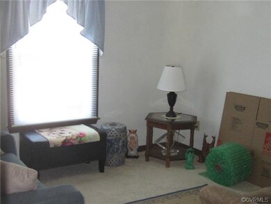 Bedroom with newer carpet.  Light and bright.