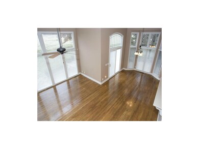 Hearth room and breakfast room with soaring ceilin