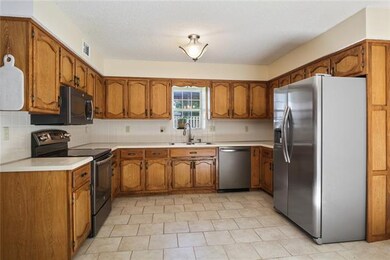 207 N Darrowby Dr, Raymore, MO 64083 - photo 5