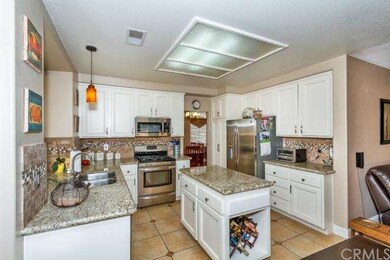 Kitchen with Granite Counter Tops.