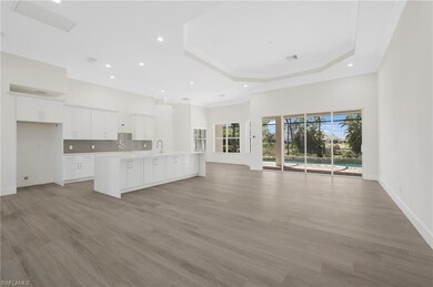 Unfurnished living room featuring visible vents, a