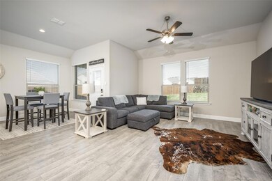 Open concept dining and living area perfect for th