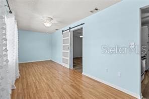Office, bonus. Barn door to Primary Bed