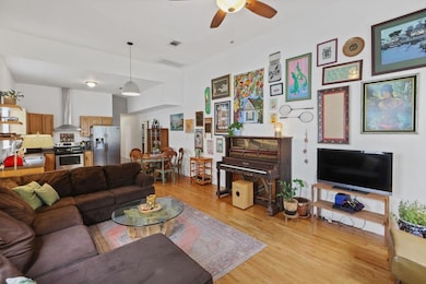 As you walk in on the 204 (left) side, you are greeted by 12 foot ceilings in your open living / dining / kitchen space.