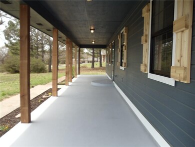 Large covered front porch. Plenty of room for porc