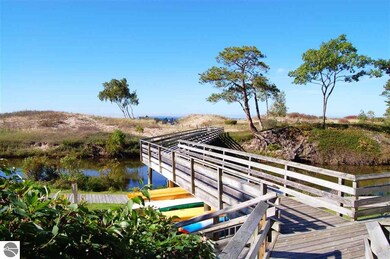 The footbridge next to the condo that crosses to t