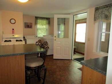 View of the kitchen w/washer dryer area