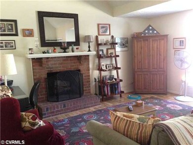 Living Room - Wood floors and sunny bay window