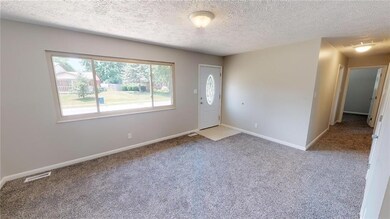 Natural Lighting and New Paint Throughout!