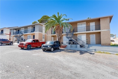 View of property featuring stairs