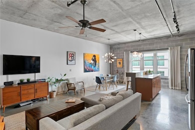 This beautifully updated loft- style residence at The Meridian offers one bedroom and 1.5 baths with authenticindustrial character—polished concrete floors, exposed block walls and exposed ductwork—framing a generous open great room ideal for entertaining that combines living, dining and kitchen.