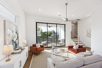 A few stairs lead to a half-bath affording privacy from the main living area.