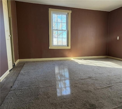 View of tiled spare room