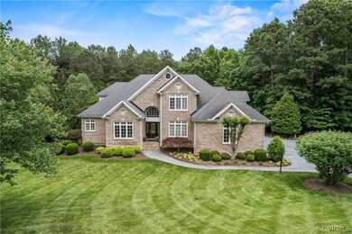 View of front of property with a front yard