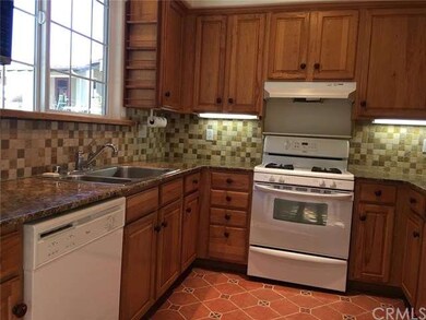 Extra large window in the kitchen let in a wonderf