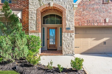 Beautiful stone and brick exterior, mature trees a
