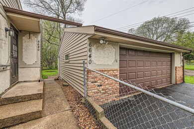 Sidewalk leading to the backyard
